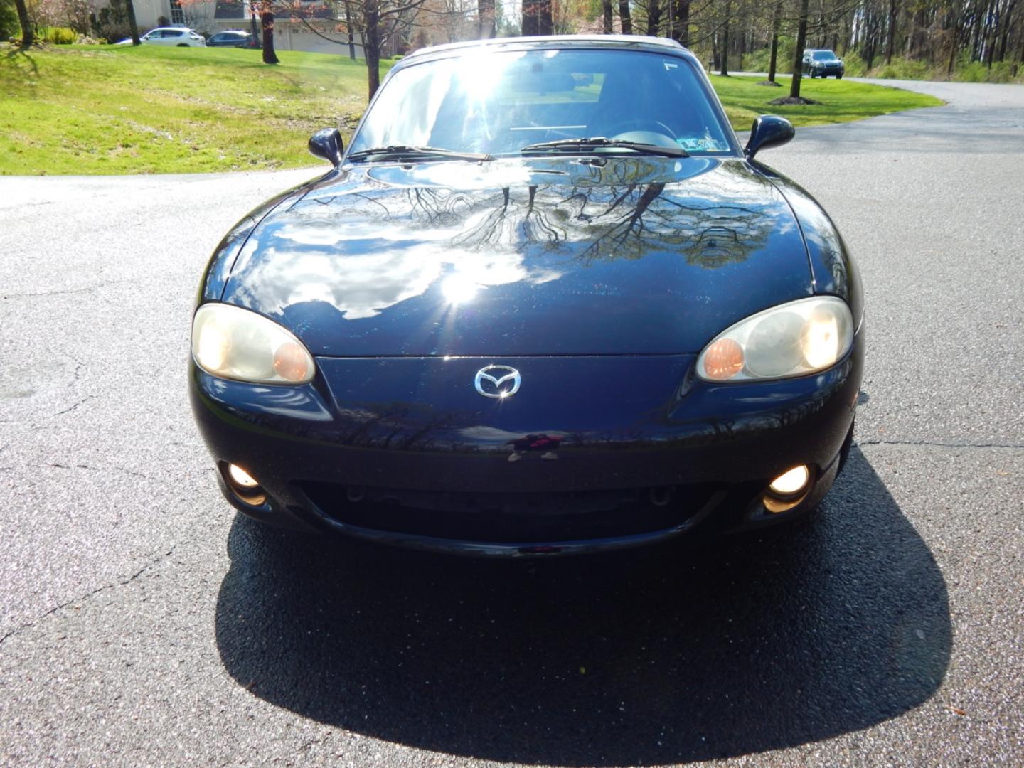 2002 Black /Black Cloth Mazda MX-5 Miata base (JM1NB353920) with an 1.8 liter 4 cylinder engine, 5 speed manual transmission, located at 6528 Lower York Road, New Hope, PA, 18938, (215) 862-9555, 40.358707, -74.977882 - Here for sale is a very fun 2002 Mazda MX-5 Miata. Under the hood is a strong running 1.8 liter 4 cylinder which puts power to the rear wheels via a solid shifting 5 speed manual transmission. Features include; Black cloth interior, wood grain trim, cold AC, power windows, AM/FM/CD, heated rear wi - Photo#3